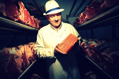 Peter Hannan of Hannan Meats holding a Himalayan salt brick in the dry-ageing chamber